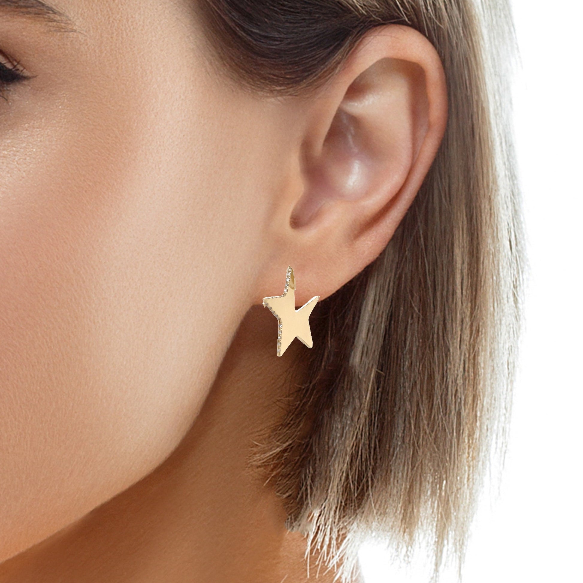 Try on view of 14k Yellow Gold Diamond Large Star Diamond Earrings 