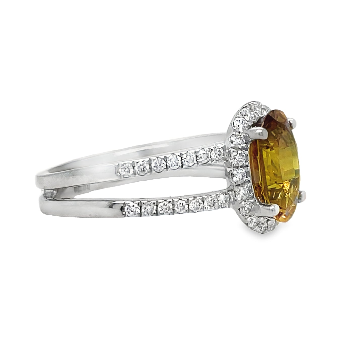 &nbsp;Expertly crafted from platinum, this stunning ring features a 0.37 ct double row of sparkling round diamonds and a beautiful oval brownish yellow sapphire. Elevate any look with this luxurious and unique piece, perfect for any occasion.