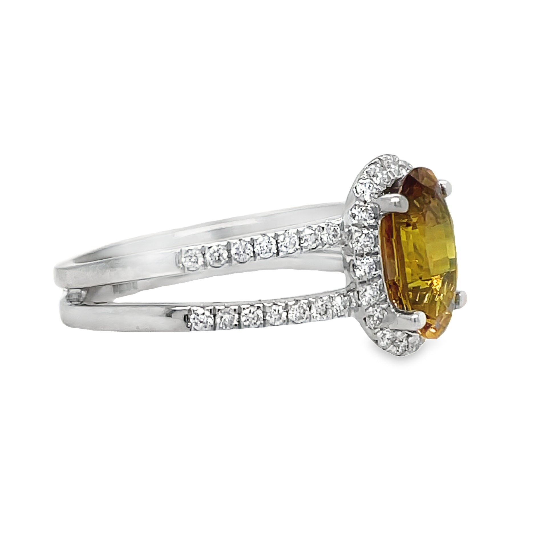 &nbsp;Expertly crafted from platinum, this stunning ring features a 0.37 ct double row of sparkling round diamonds and a beautiful oval brownish yellow sapphire. Elevate any look with this luxurious and unique piece, perfect for any occasion.