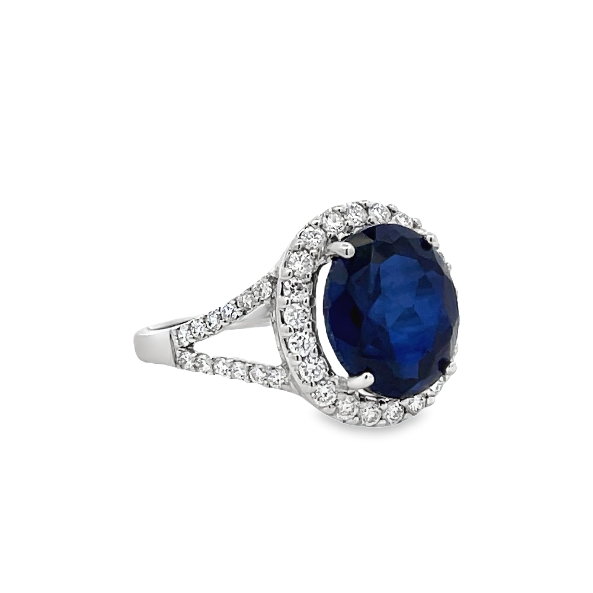 Side view of Oval Shape Blue Faceted Sapphire and Diamond Ring