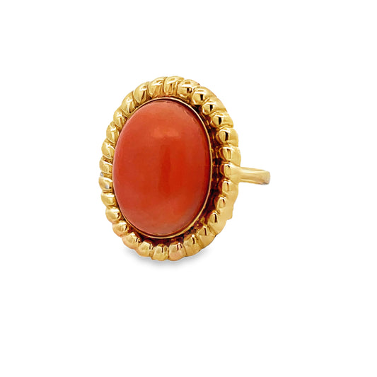Side view of 14k Yellow Gold Oval Shape Coral Ring 