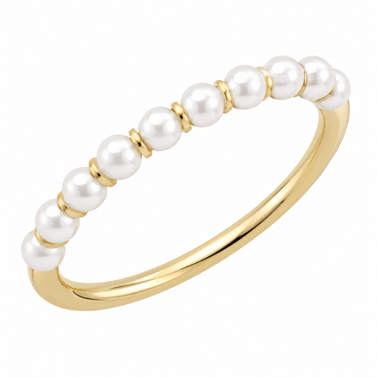 top view of gold ring with pearls on a white background