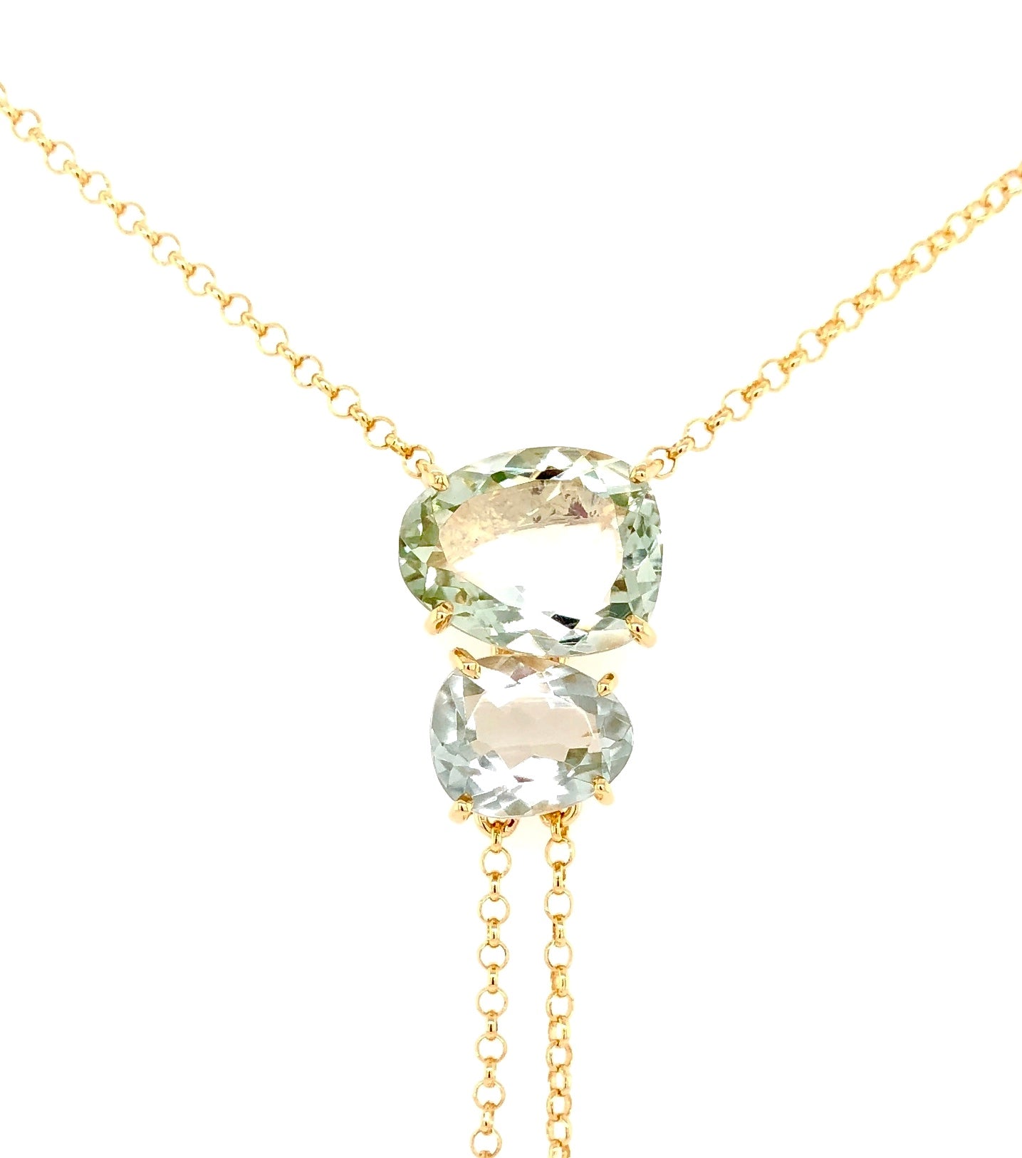 Indulge in luxury with our Brazilian made lariat necklace. Crafted from 18k yellow gold, this stunning piece features 6.80 cts of prazolite gems and 0.06 cts of round diamonds. The secure lobster catch ensures both beauty and functionality. Elevate your style with this exclusive and sophisticated necklace.
