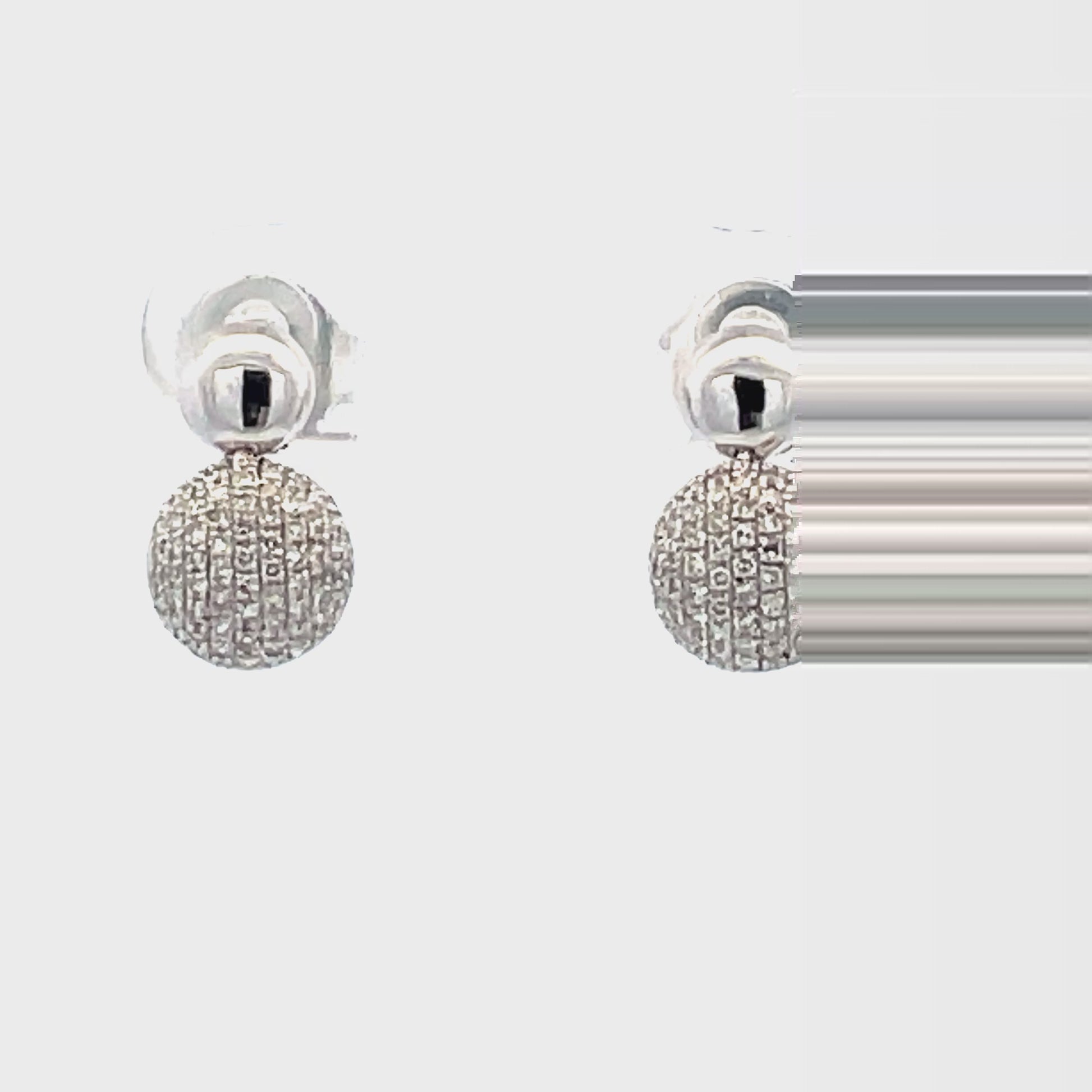 Try on view of 18k White Gold Small Diamond Pave Drop Earrings 