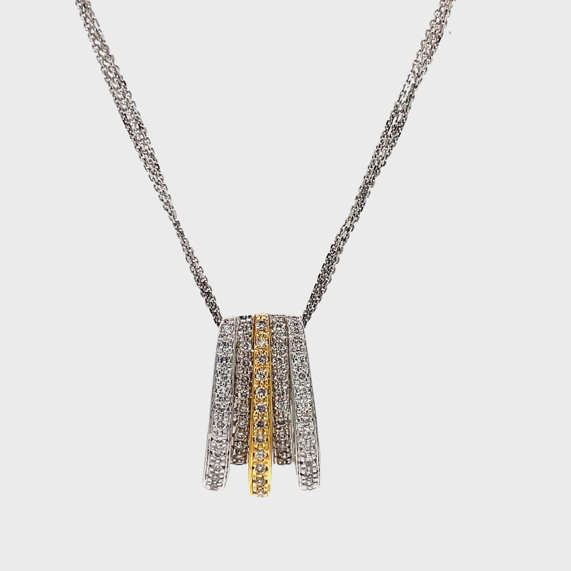 Expertly crafted with 1.10 carats of round diamonds, this Two Tone Slider Pendant Necklace is a stunning addition to any jewelry collection. Made with 14k white gold and a three diamond cut 16" chain, this necklace also features a 2" extension for a customizable fit. Elevate any look with the 1" pendant for a touch of elegance and sophistication.