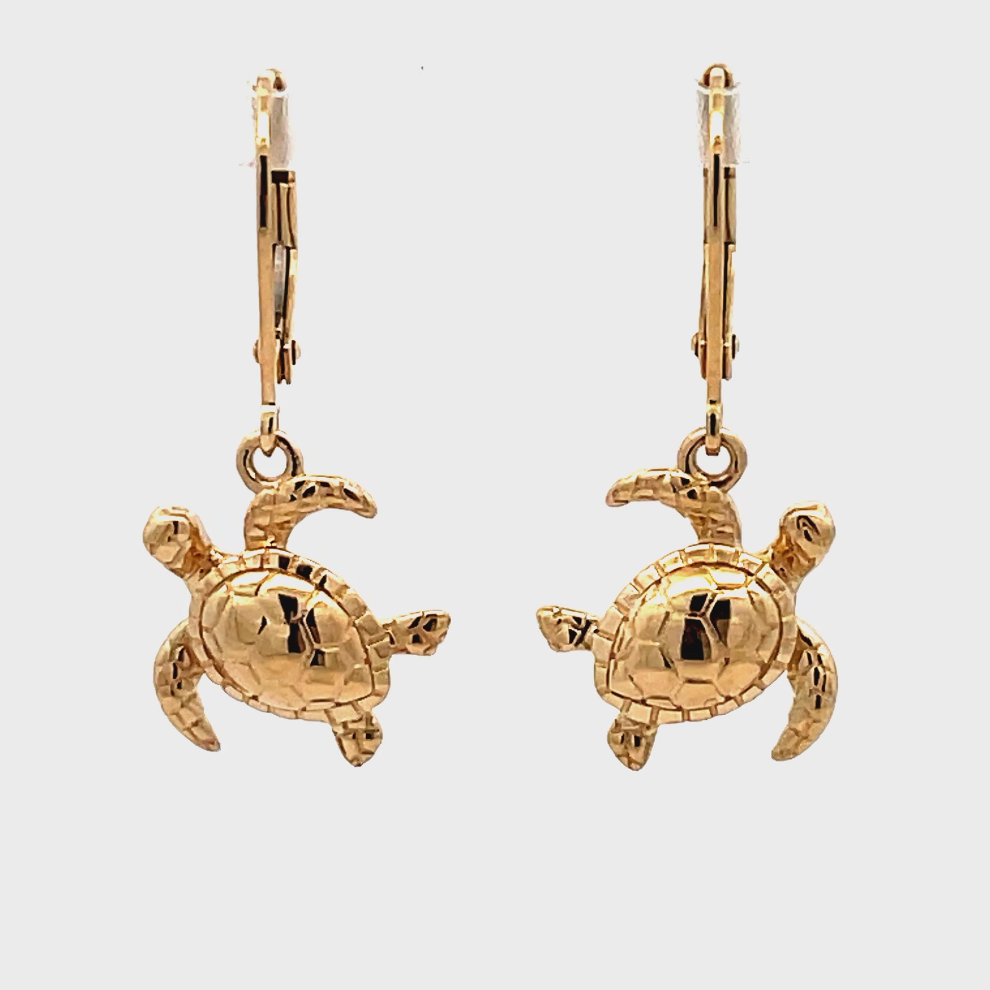 Try on video of 14k Yellow Gold Turtle Earrings