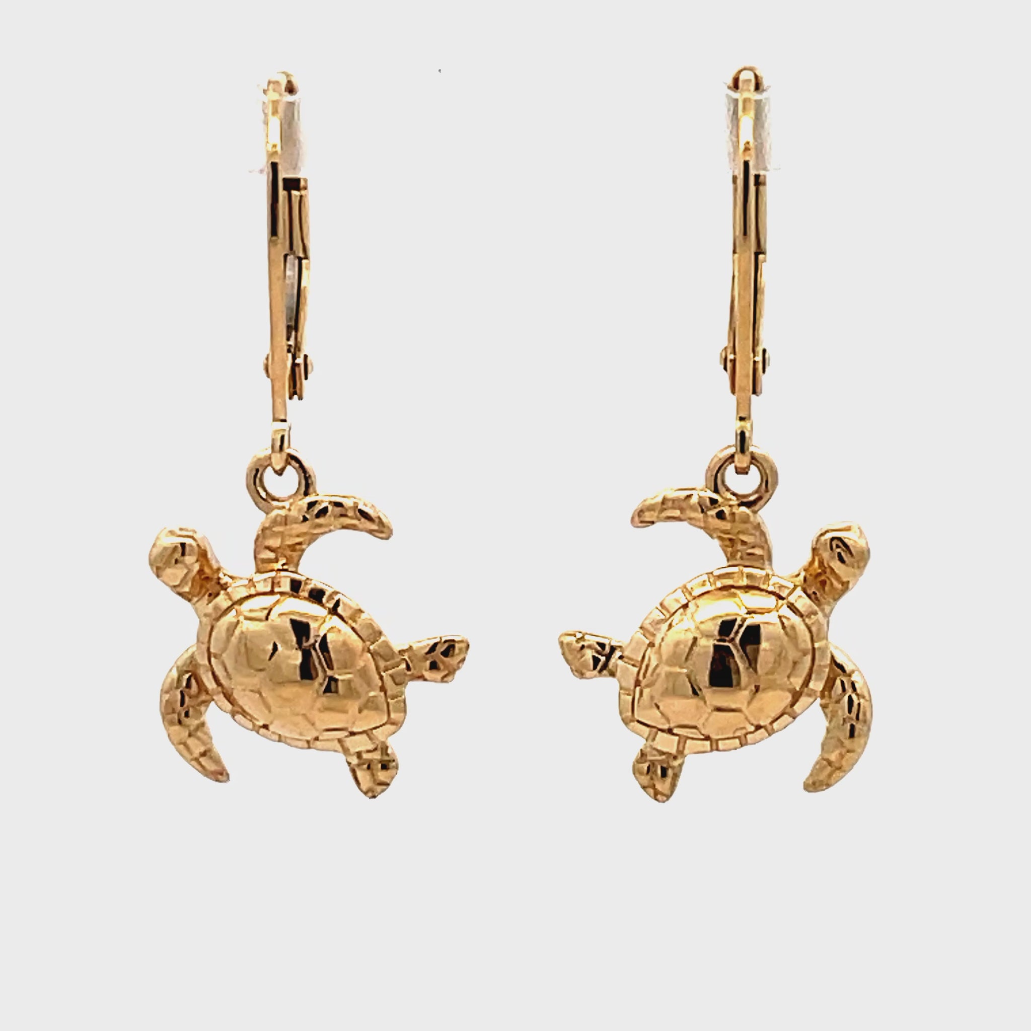 Try on video of 14k Yellow Gold Turtle Earrings