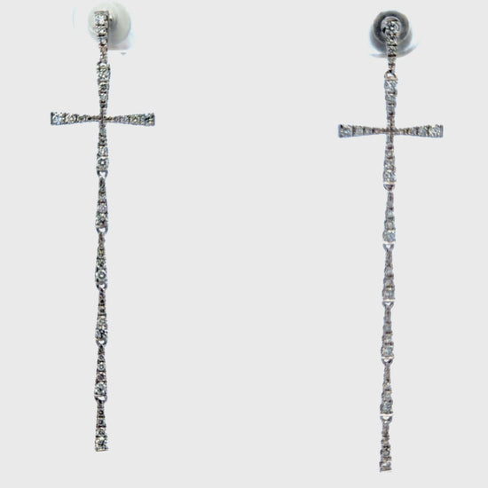 Try on view of 14k Diamond Cross Dangle Earrings in White Gold
