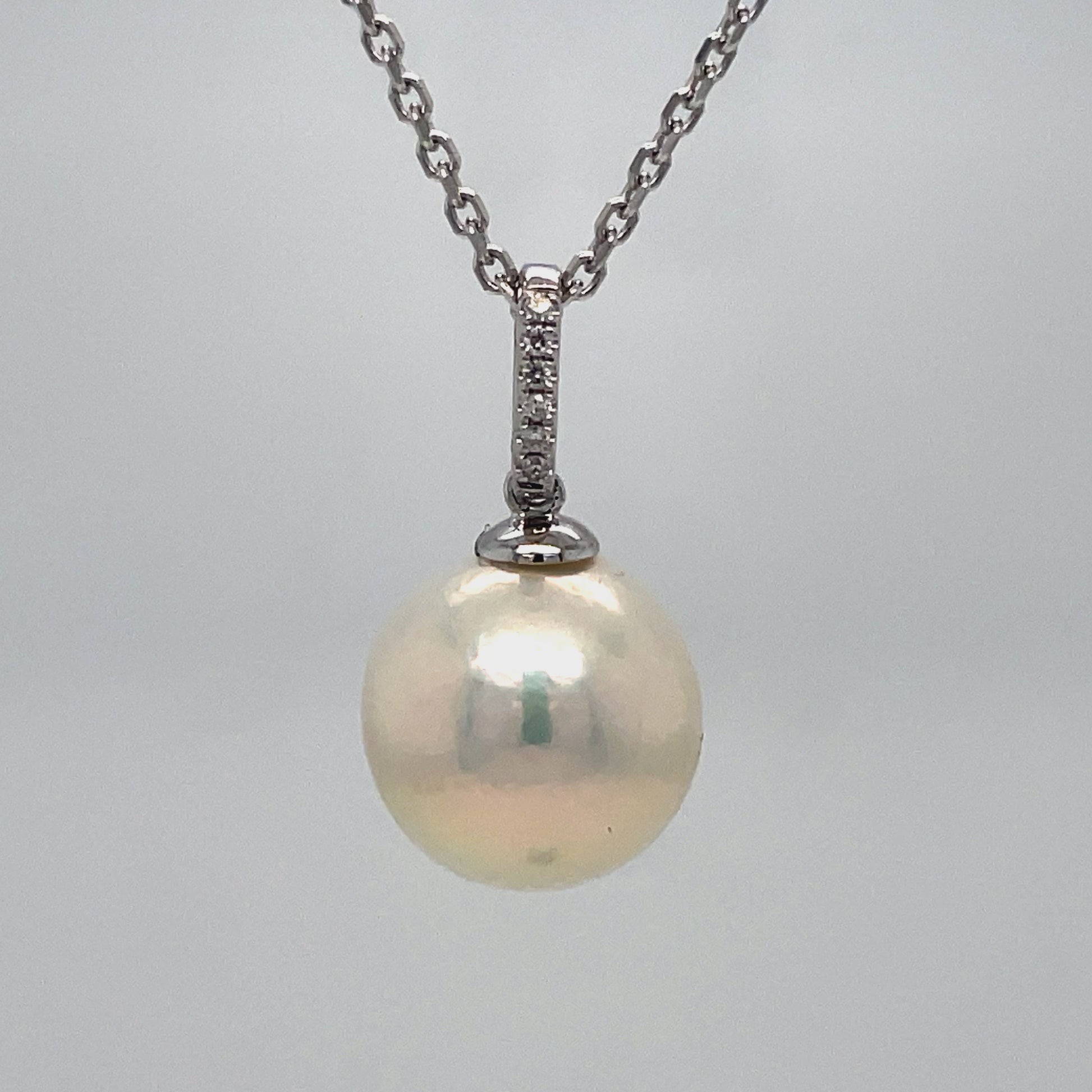 Try on video of 14k White Gold South Sea Single Pearl Diamond Pendant Necklace 12.00 mm