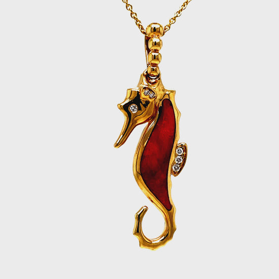 ransform into the elegant creature of the sea with our 14k Diamond Red Spinel Seahorse Pendant Necklace. Crafted with 14k yellow gold, the red spinel and diamond accents add a touch of sophistication. A must-have for any fashionista who seeks to stand out in style.