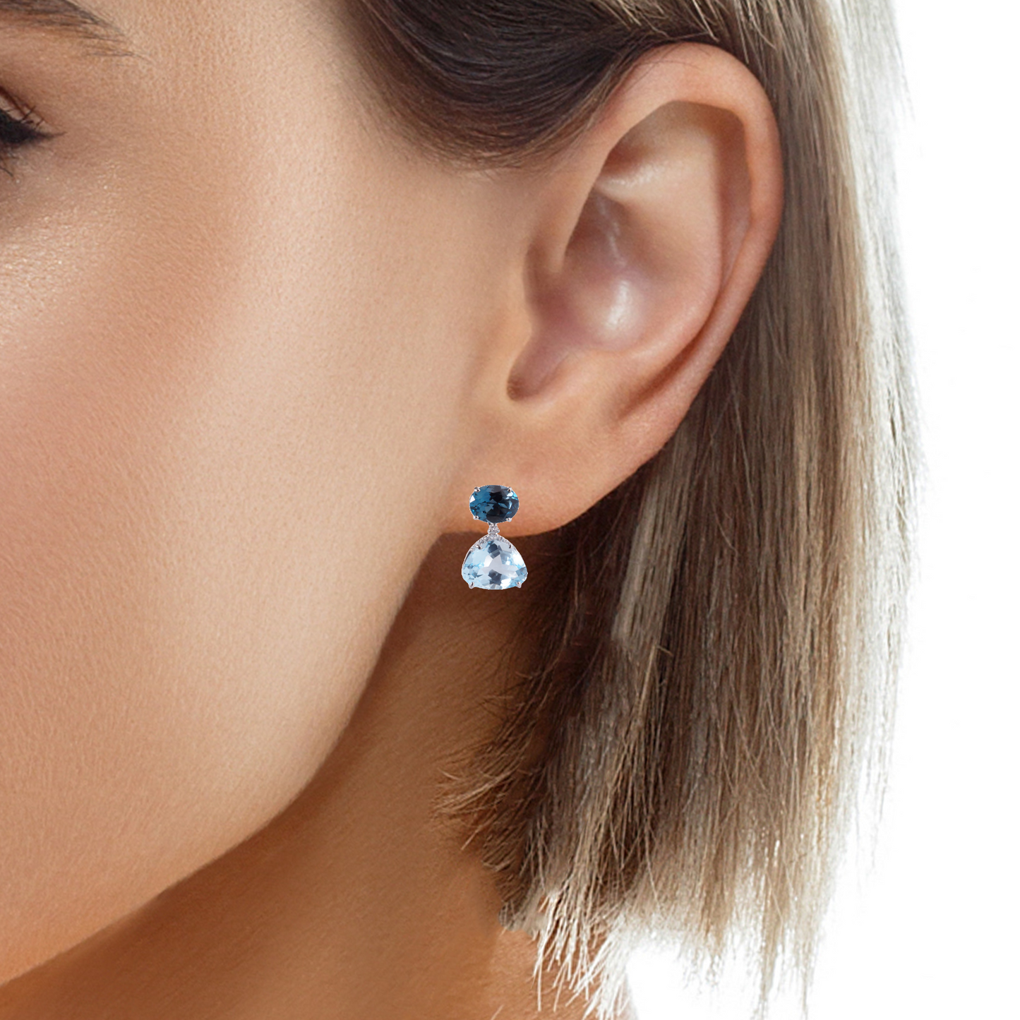 Try on view of 18k White Gold Blue London & Topaz drop earrings