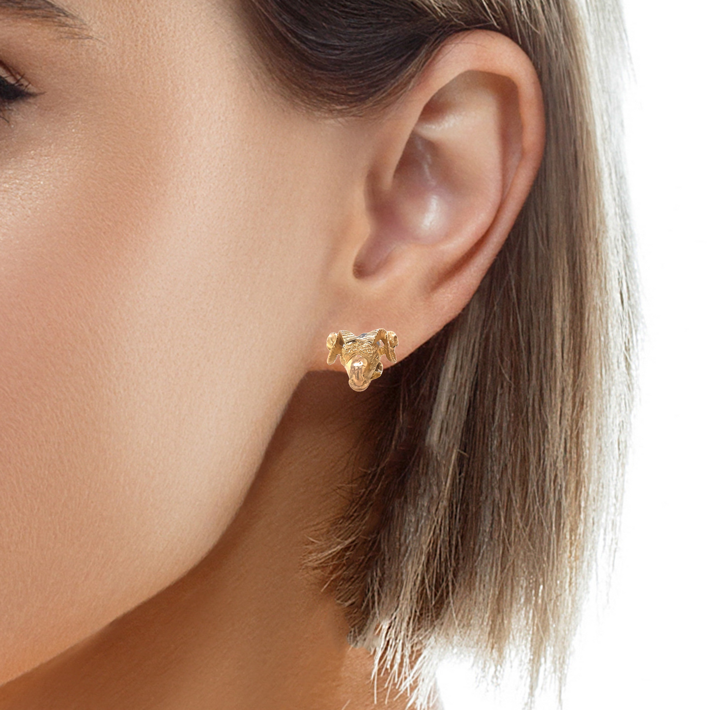 Try on view of Estate 14k Ram Yellow Gold Stud Earrings