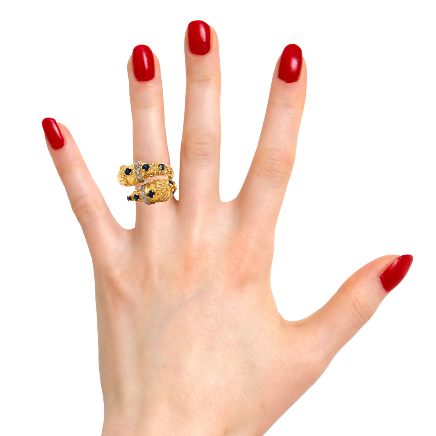 Try on view of Estate Sapphire and Diamond Crossover Lion ring