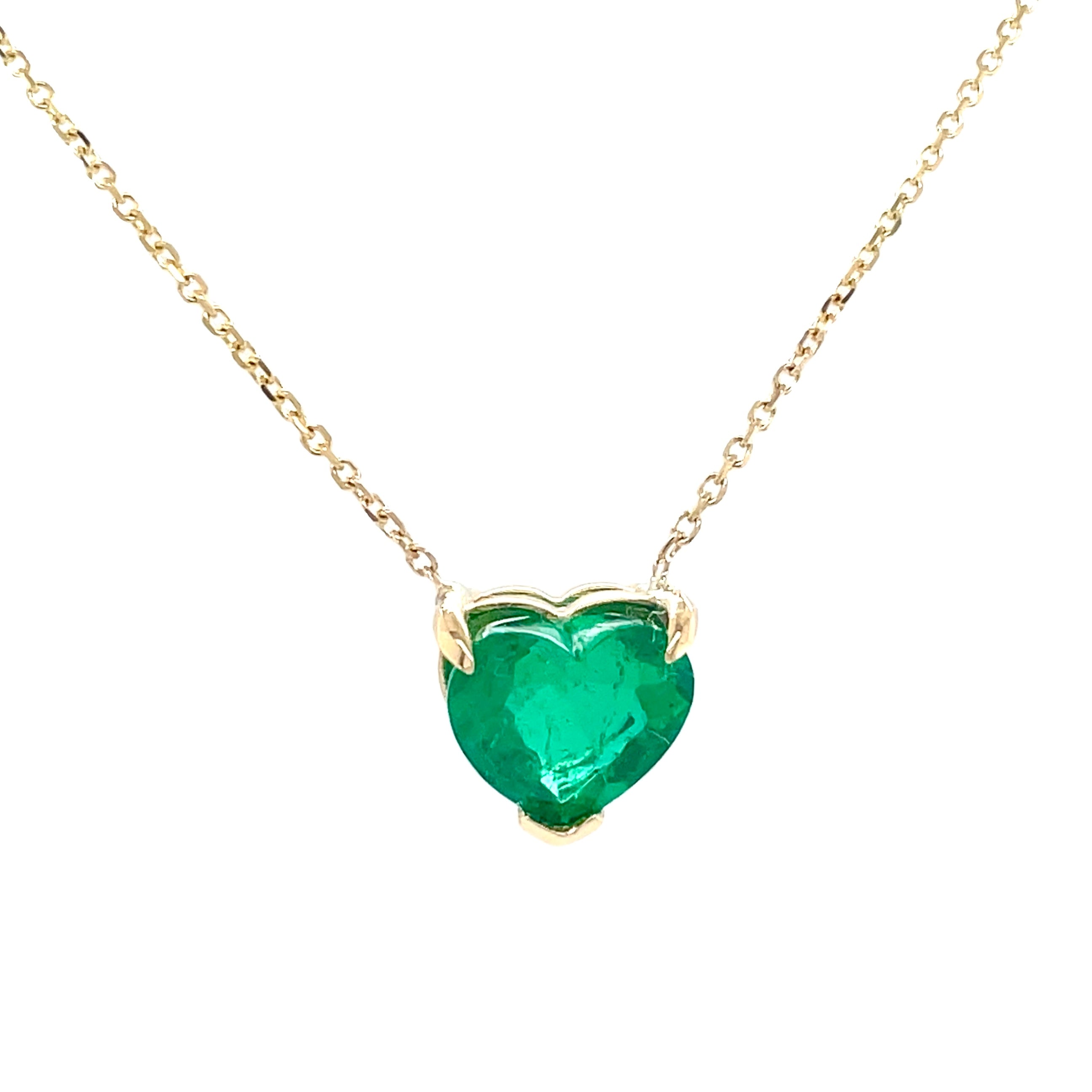 Emerald heart necklace  Perfect for Valentines   From Muzo mines  One heart shape diamond 1.90 cts  14K yellow gold basket setting  18" long.