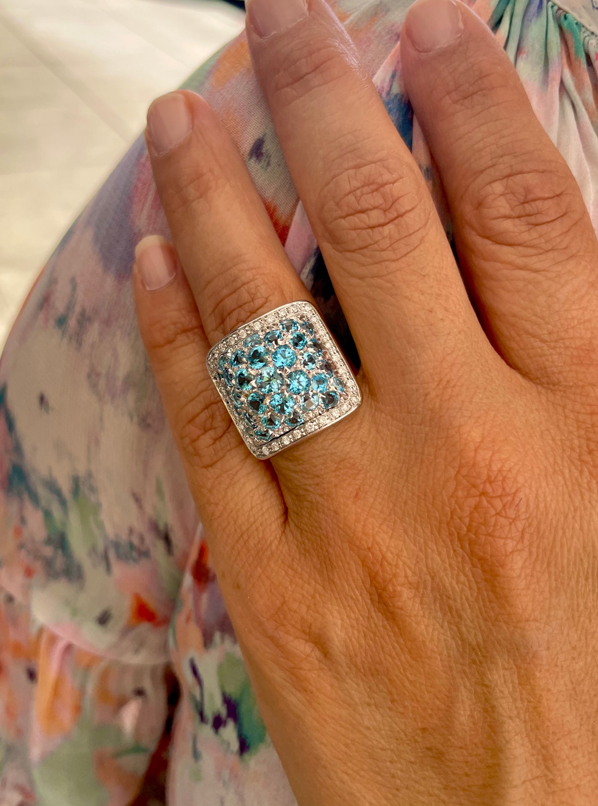 Try on view of 18k White Gold Italian Made Blue Topaz & Diamond Italian Ring