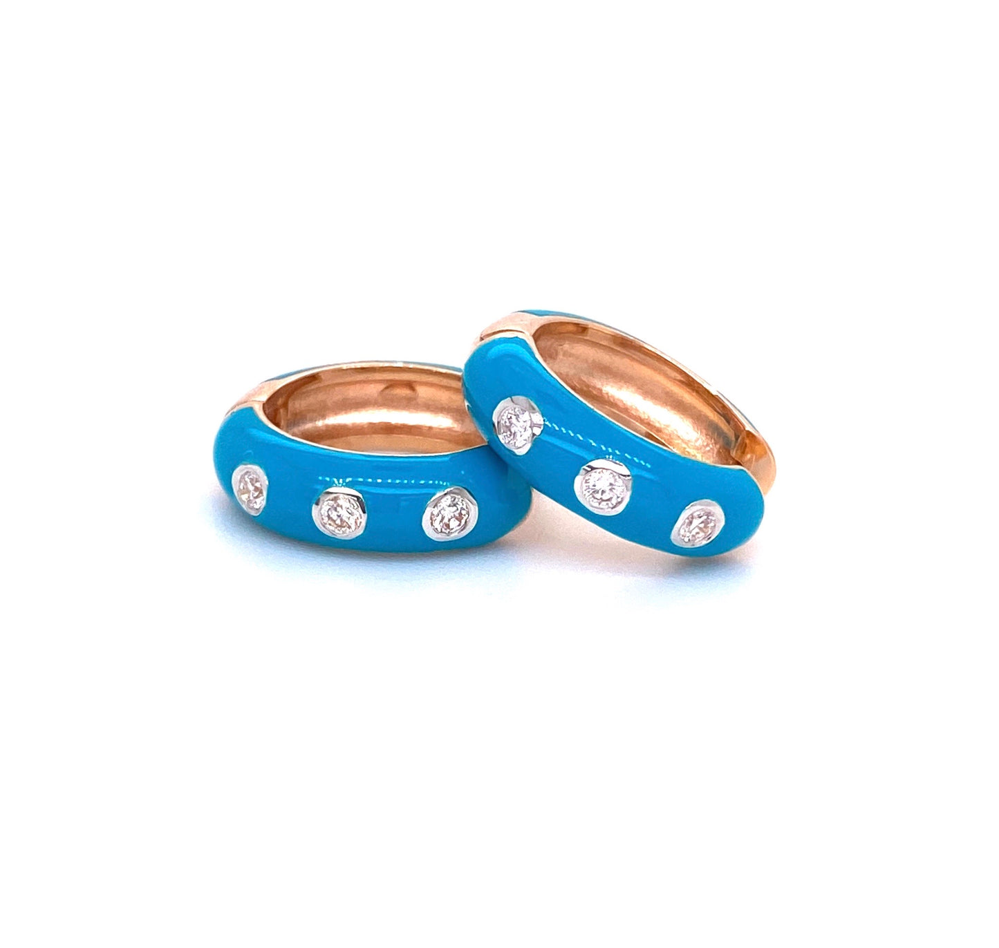 Front view of 14k Rose Gold Blue Enamel & Diamond Huggie Earrings