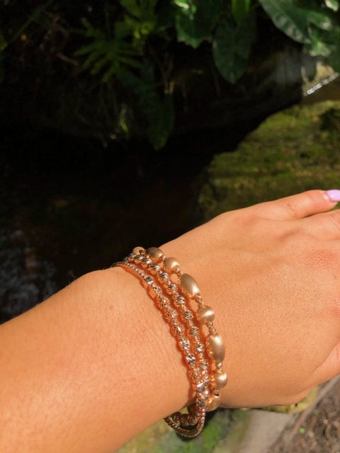 Try on view of 14k Rose Gold Gold Diamond Cut Bangle