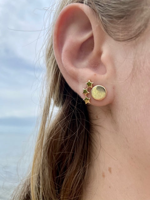 Try on view of 14k Yellow Gold Italian Made Flat Round Stud Earrings