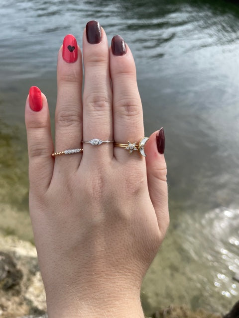 Try on view of 18k Diamond crescent moon ring